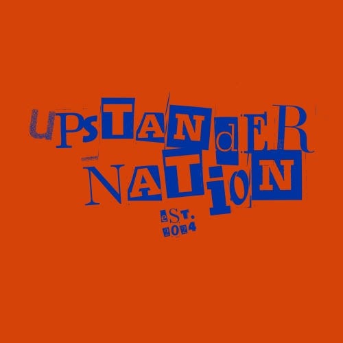 Blue spray-paint stencil style letters on an orange background say "Updatander Nation, eat. 2024"