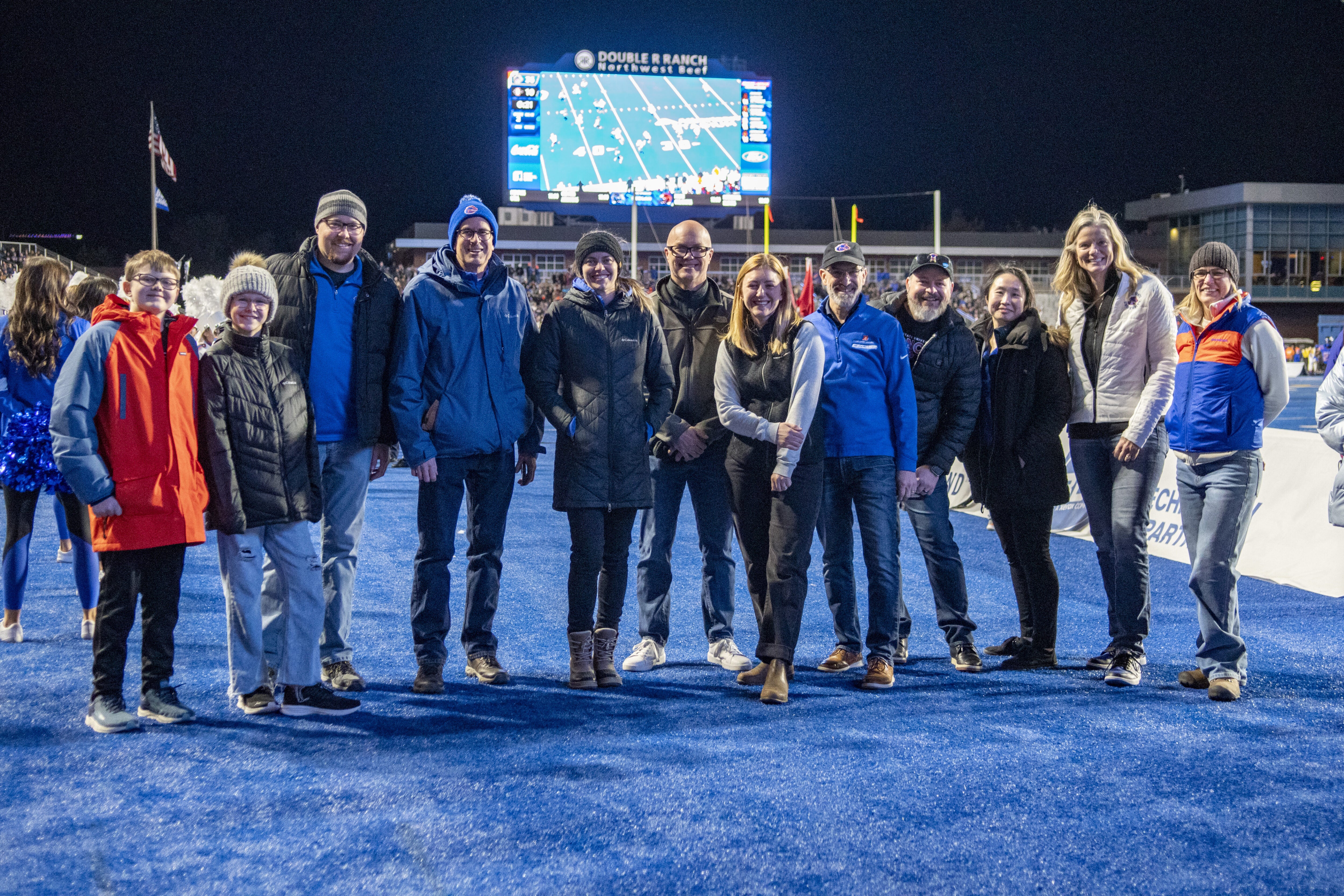 Representatives of the College of Business and Economics were honored as “Blue Turf Thinkers” at the Nov. 1 football game vs. San Diego State. Photo by Luan Teed