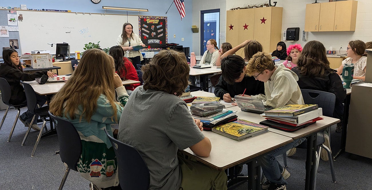 a Boise State student leads an exercise in a middle grade classroom 