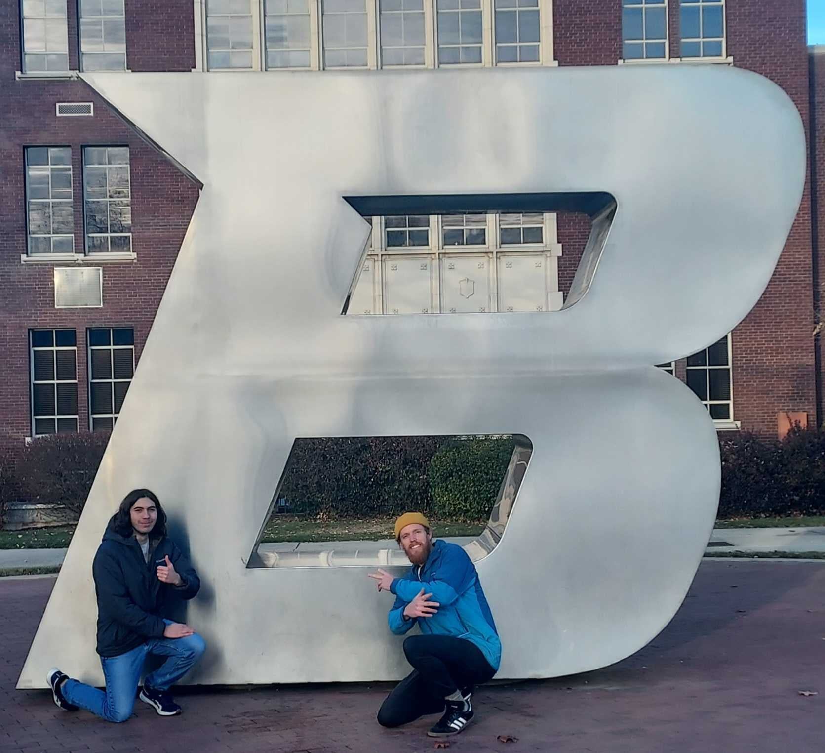 Boise State Math students Antonio Cariello and Max Hewes posing near the iconic B on Boise State's Boise campus.