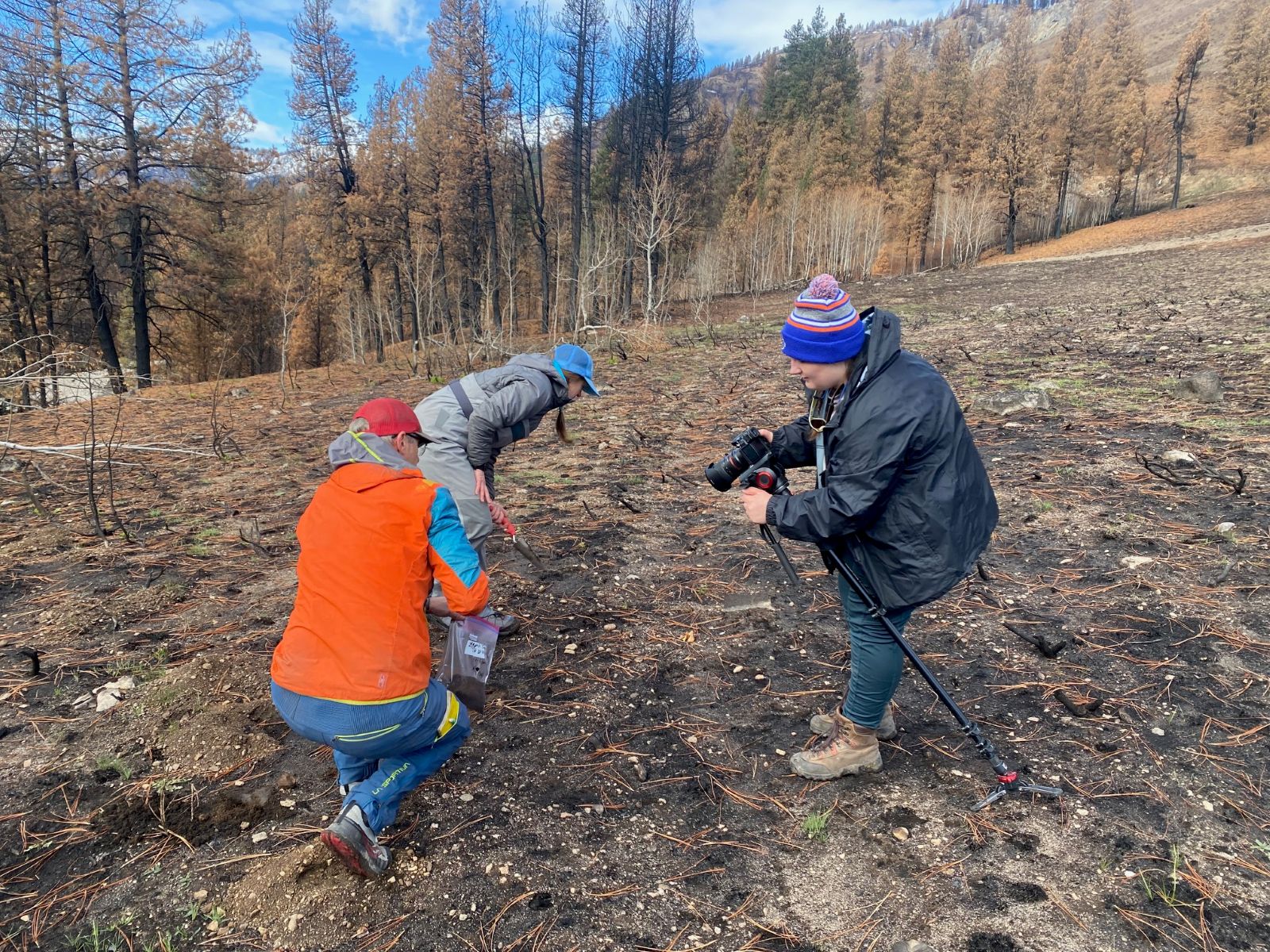 Boise State media student Gillian Simcoe in the field with School of the Environment faculty