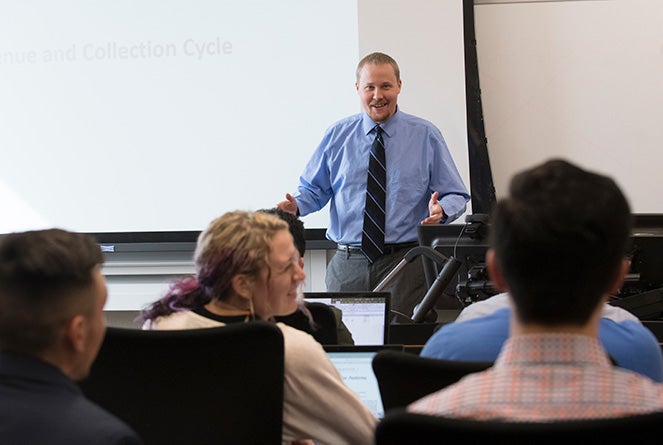 Josh Filzen lecturing in a class at Boise State