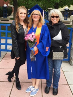Amy Clark, BA, MDS, with her daughter and mother at her Boise State University graduation, 2017.