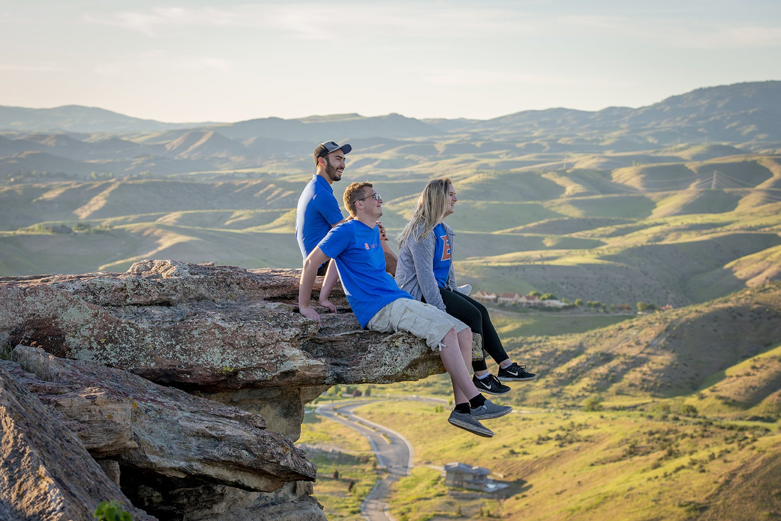 Three students observe the Idaho wilderness.