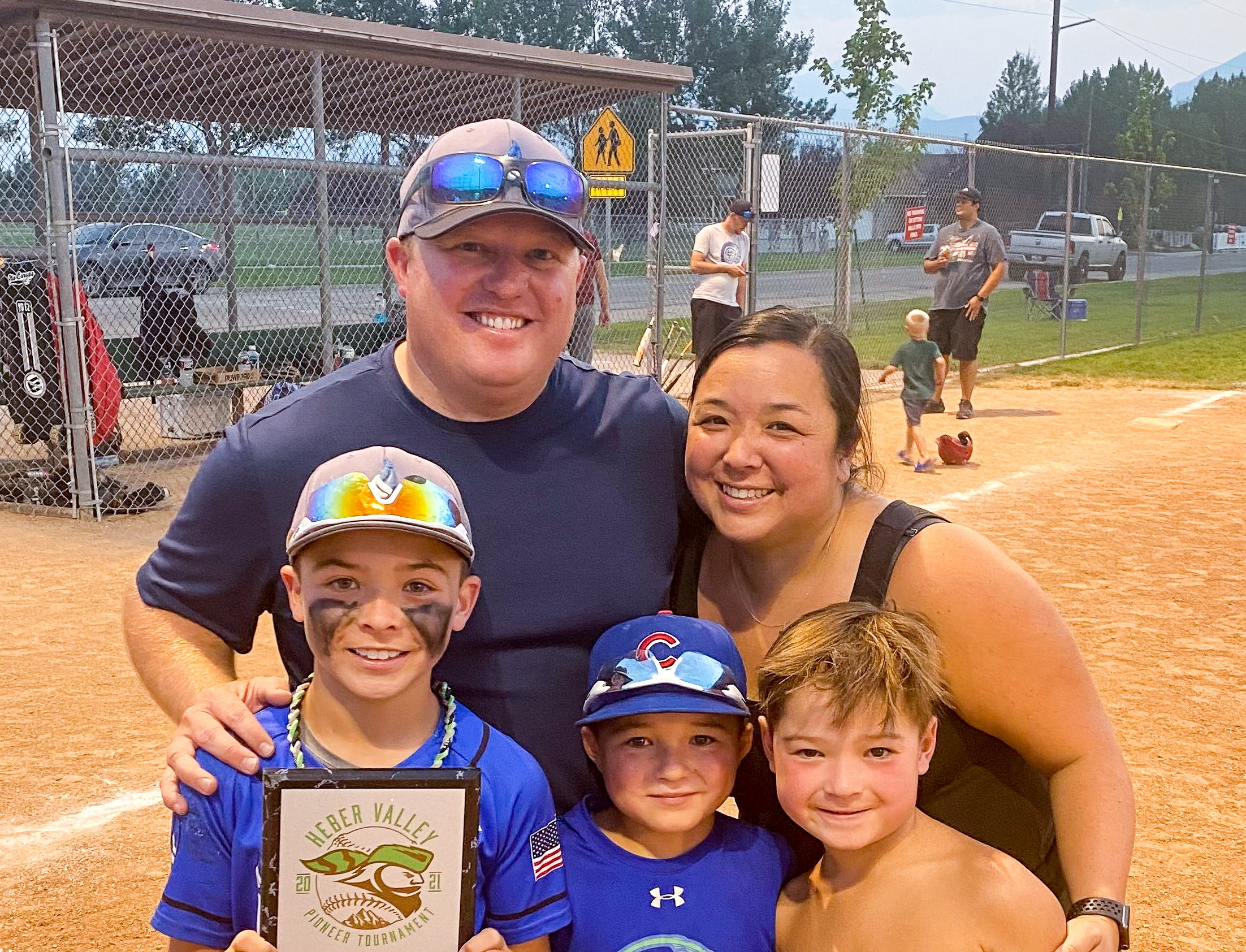 John Heintzberger and his family at a baseball game.