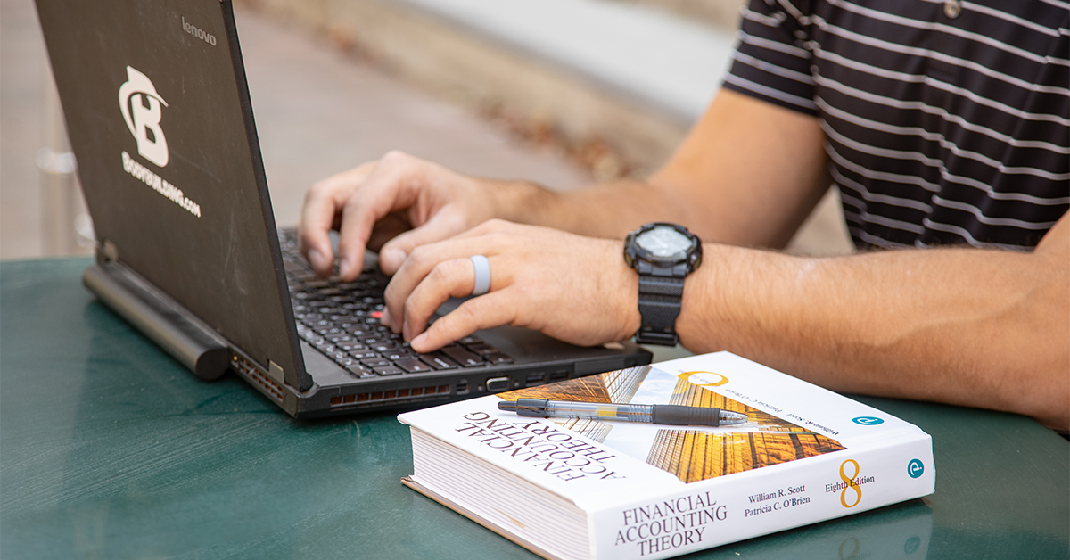 A student works on accounting homework.