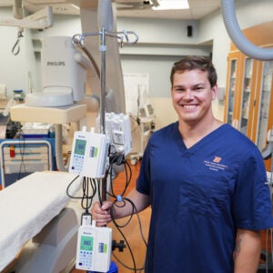 Daniel Connaughton in front of imaging equipment.