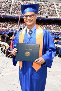 Kevin Herrera at his graduation for his Bachelor of Business Administration