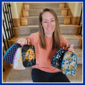 Koerner displays some of her beautifully sewn, handmade bags.