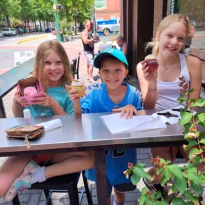 Cleo, Finn, and Phoebe eating cupcakes before heading to a movie.