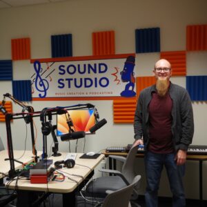 A photo of Chris Saunders in the Boise State Recording Studio