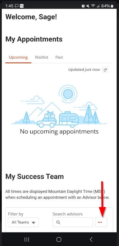 Mobile interface. A red arrow is pointing at the three dot menu in the lower right corner