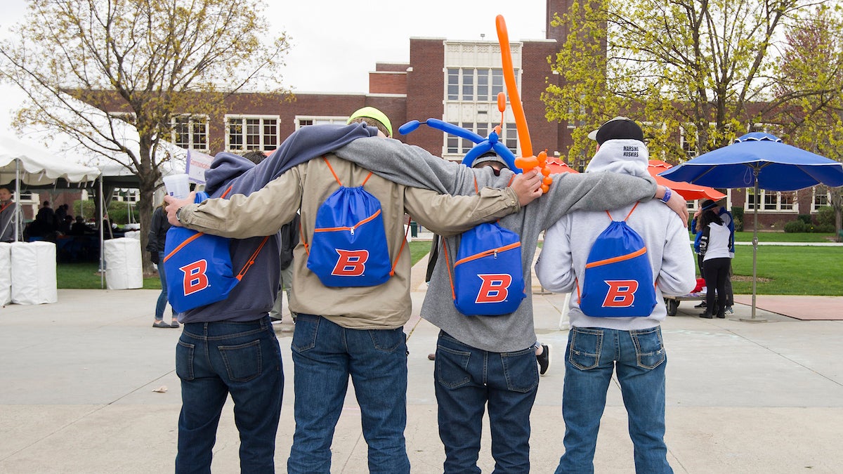 Students with Boise State bags