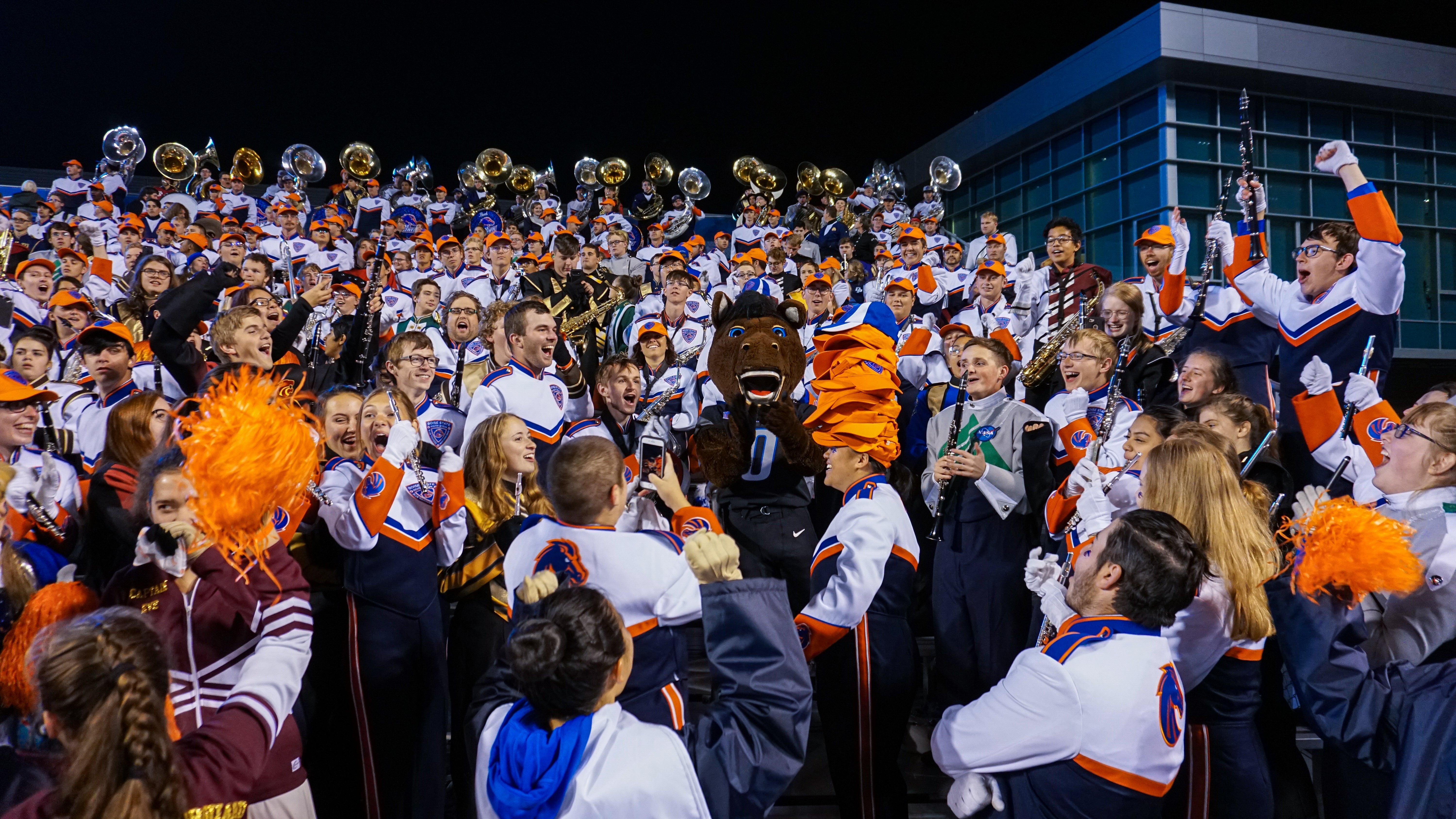 honor band celebrates with Buster Bronco